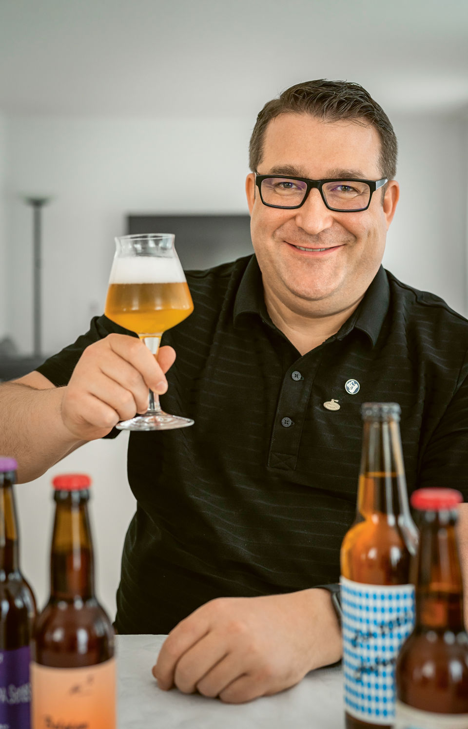 Foto von Alex Rinderknecht, Leiter Credit Office bei der St.Galler Kantonalbank und diplomierter Biersommelier, bei der Bierverkostung